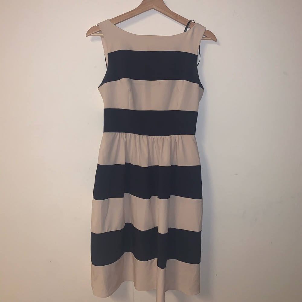 B. Darlin tan and navy blue striped dress